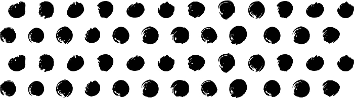 Monochrome pattern made of small circles drawn with a brush