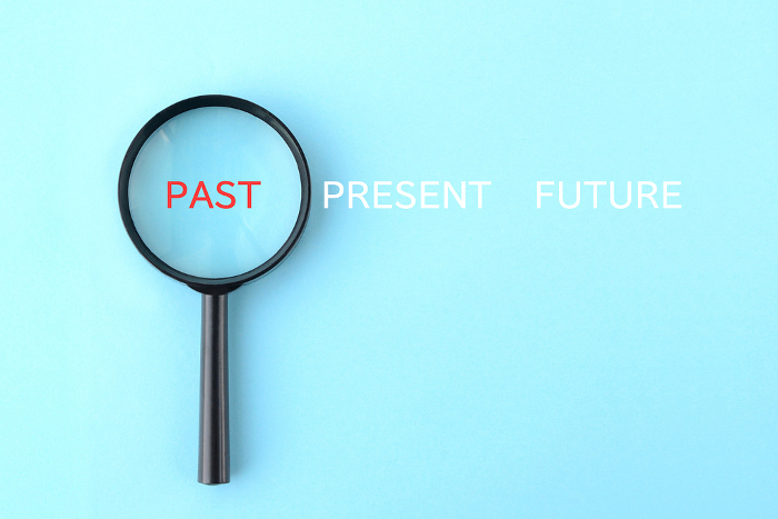 Magnifying glasses and past, present, and future English words
