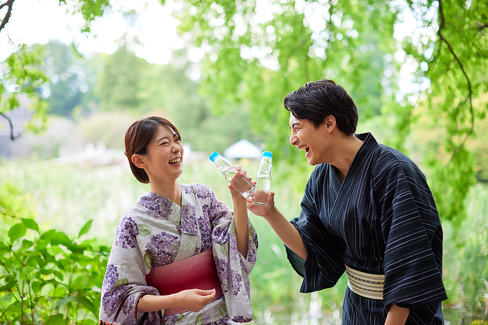 Japanese couple drinking Ramune
