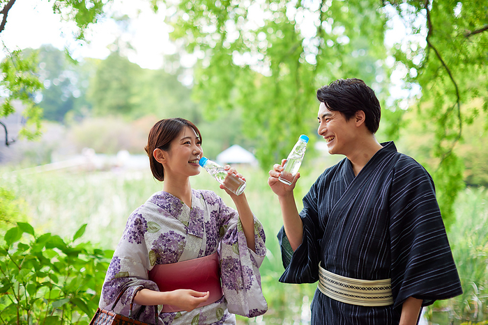 Japanese couple drinking Ramune
