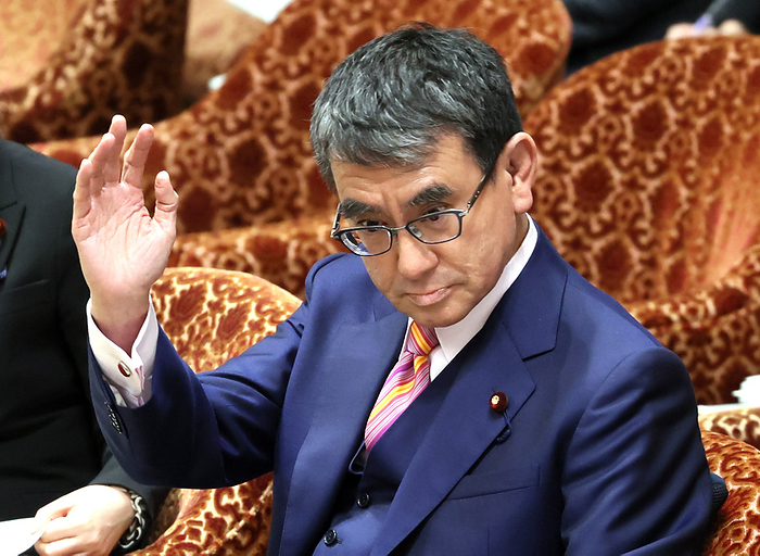 Japanese Digital Transformation Minister Taro Kono attends Lower House s ad hoc committee session March 13, 2024, Tokyo, Japan   Japanese Digital Transformation Minister Taro Kono raises his hand to answer a question at Lower House s ad hoc committee for digital and children related policies at the National Diet in Tokyo on Wednesday, March 13, 2024.     photo by Yoshio Tsunoda AFLO 