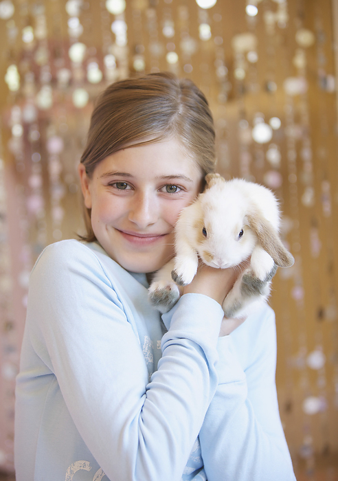 Girl Holding white Rabbit