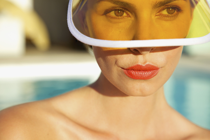 Woman with Red Lips Wearing Yellow Visor