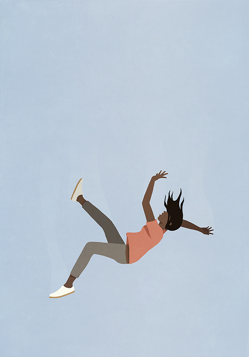 Woman falling midair against blue sky