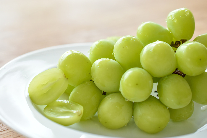 Grapes on a plate on the table