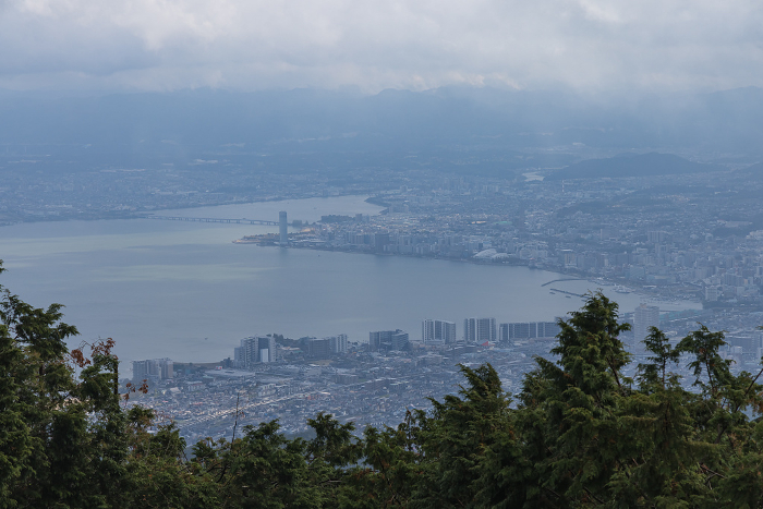 Cityscape of Otsu and Lake Biwa from the Garden Museum Hiei parking lot on Mt. Hiei, Kyoto, Japan