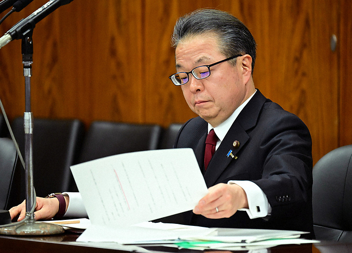 Political Fund Issues: Political Ethics Examination Committee in the House of Councillors Former LDP Secretary General Hiroshige Seko of the House of Councillors reviews documents at the Upper House Political Ethics Examination Council, 10:43 a.m., March 14, 2024, in the Diet.