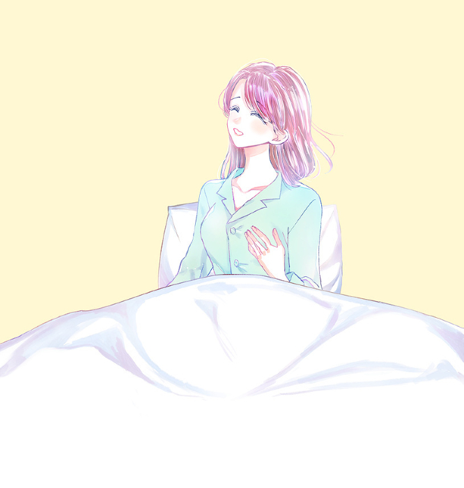 Woman in pajamas with a neat and clean look on the bed