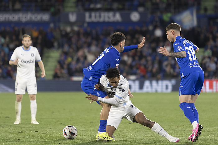 LA LIGA EA Sports   Getafe vs Girona    MADRID, SPAIN   March 16:Jastin Garcia of Girona and Carles Ale  a of Getafe fight for the ball during the La liga 2023 24 match between Getafe and Girona at Coliseum Stadium.  Photo by Guille Martinez AFLO 