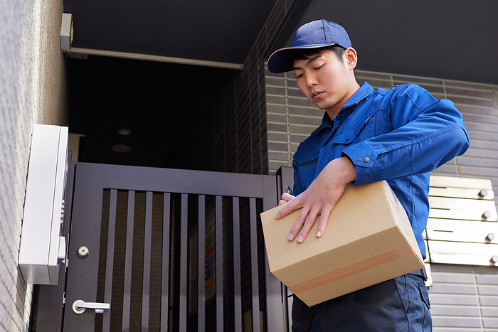 Delivery person carrying packages