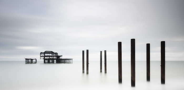 Abandoned pier Abandoned pier off the coast of Brighton, UK. The pier was closed to the public in 1975 after becoming derelict. Later arson and storms also caused further damage., by JEREMY WALKER SCIENCE PHOTO LIBRARY