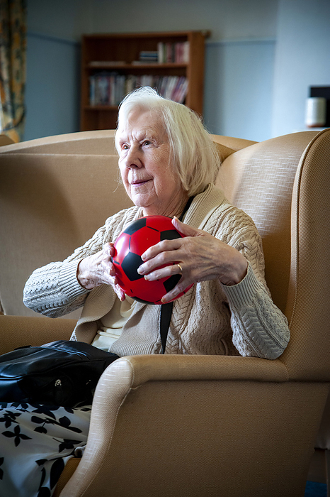 Care home resident taking part in exercise class Care home resident taking part in an exercise class., by JOHN COLE SCIENCE PHOTO LIBRARY