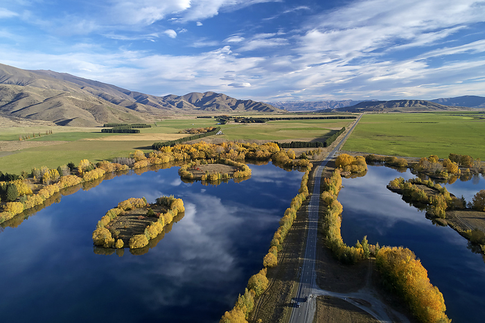 New Zealand Wairepo Arm  left , State Highway 8, and Kellands Pond  right , Twizel, Mackenzie District, North Otago, South Island, New Zealand   drone aerial