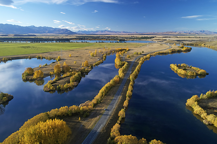 New Zealand Kellands Pond  left , State Highway 8, and Wairepo Arm   right , Twizel, Mackenzie District, North Otago, South Island, New Zealand   drone aerial