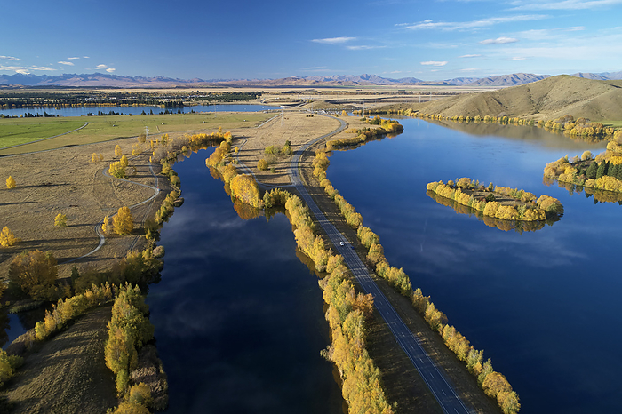 New Zealand Kellands Pond  left , State Highway 8, and Wairepo Arm   right , Twizel, Mackenzie District, North Otago, South Island, New Zealand   drone aerial