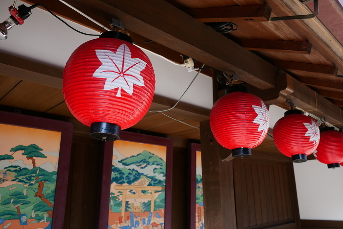 Red lanterns on the eaves of a souvenir shop