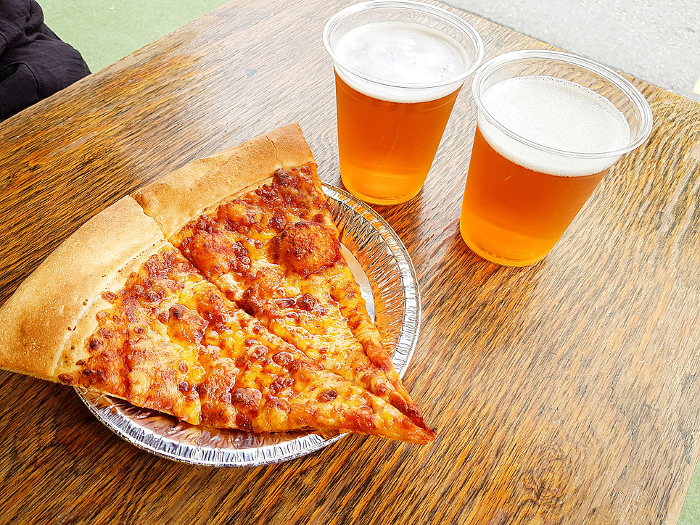 Sliced Pizza and Draft Beer