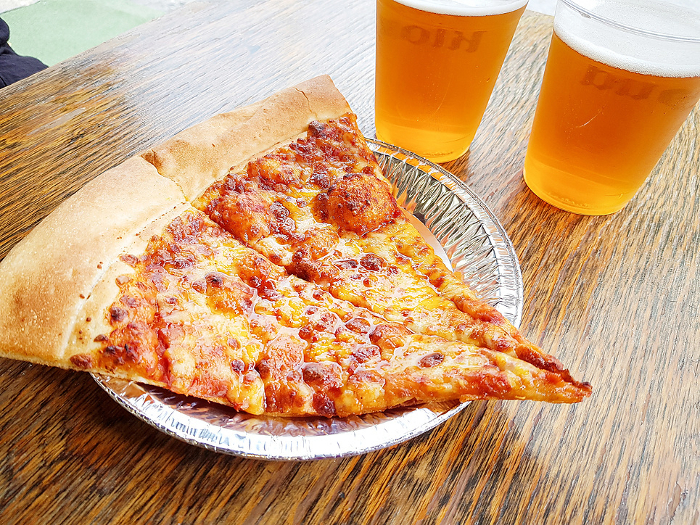 Sliced Pizza and Draft Beer