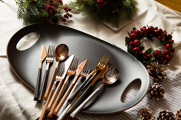 cutlery set on black tray, Christmas decorations,