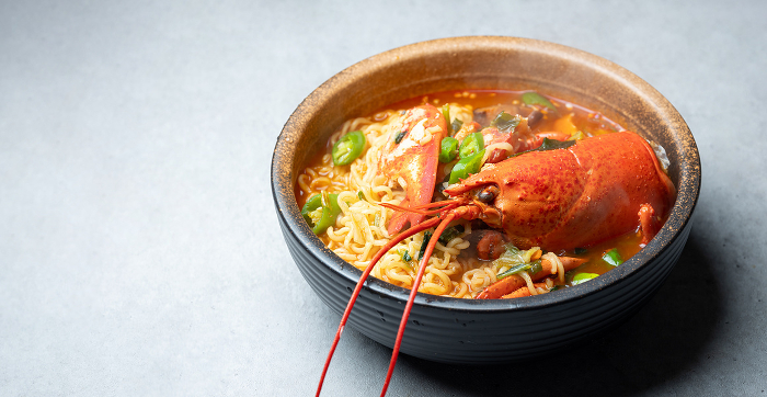 Spicy ramen with lobster in a bowl