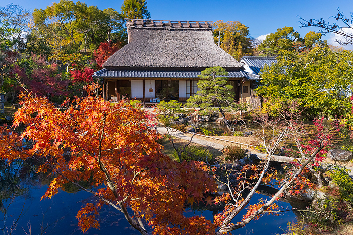 Sanshutei seen from the front garden of Yosuien in autumn foliage, Nara Prefecture