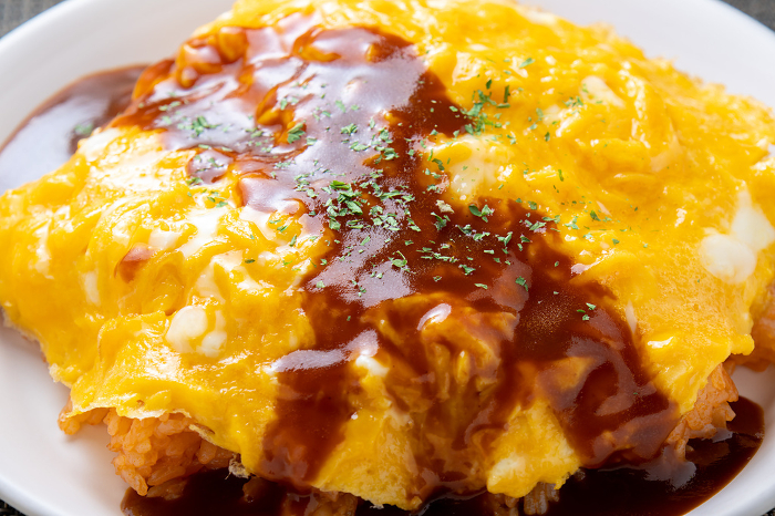 Omelette rice (unwrapped omelette rice with demi-glace sauce).