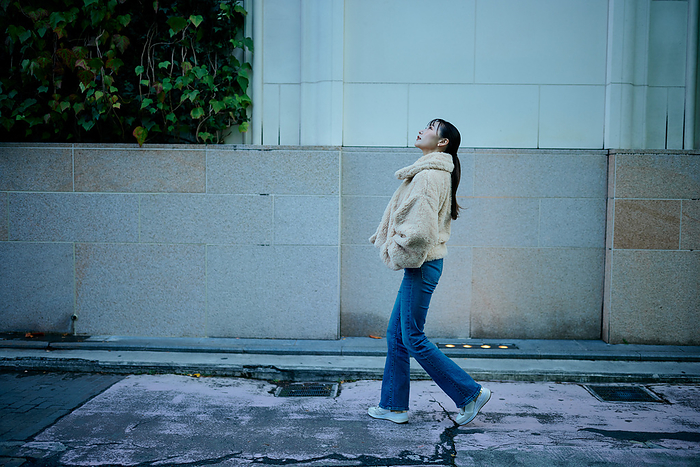 Japanese woman looking up