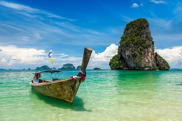 Long tail boat on tropical beach (Pranang beach) and rock, Krabi, Thailand, Asia, by Dmitry Rukhlenko
