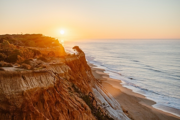 Amazing landscape of Falesia beach with orange cliffs at sunrise, Algarve, Portugal, Europe, by Eunika Sopotnicka