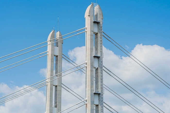 Two concrete columns of cable stay bridge against cloudy blue sky, South Korea, South Korea, Asia, by aminkorea