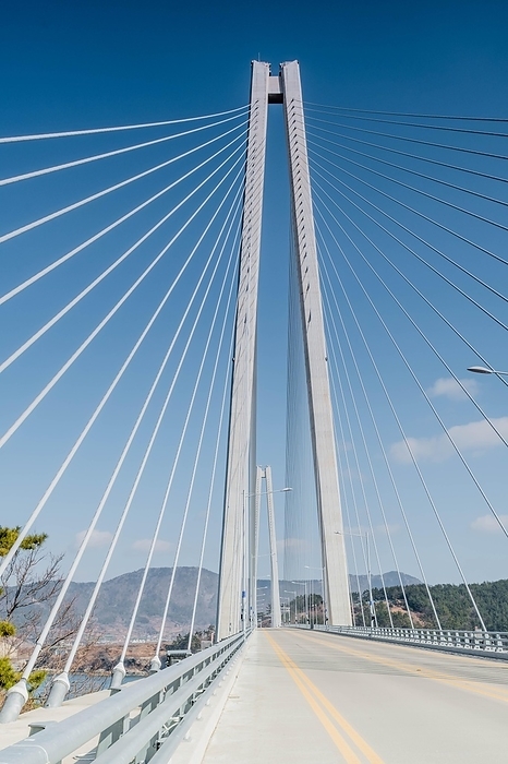 Two lane road across cable stay suspension bridge in rural countryside, South Korea, South Korea, Asia, by aminkorea