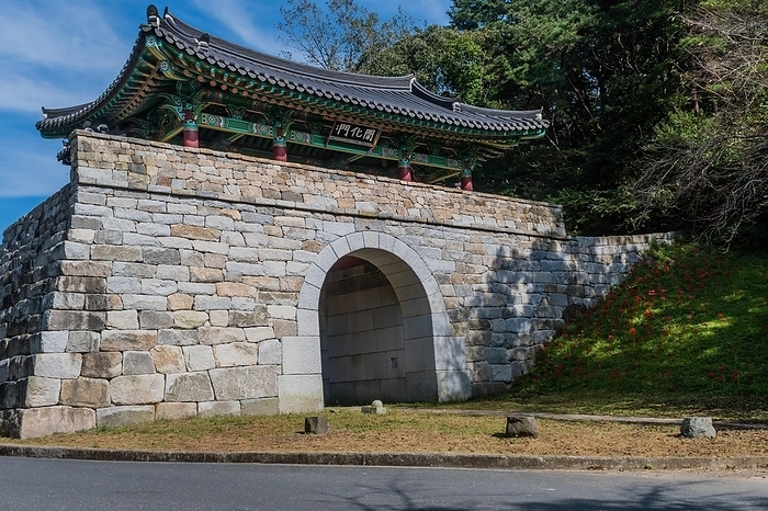 Stone front gate at entrance to Geumsansa Temple under blue sky in Gimje-si, South Korea, Asia, by aminkorea