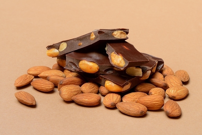 Chocolate with almonds and a bunch of almonds, Prunus dulcis, by Jürgen Pfeiffer