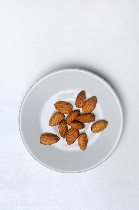 Almonds in plates, Prunus dulcis, by Jürgen Pfeiffer