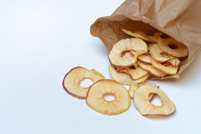 Dried apple rings in a bag, dried fruit, by Jürgen Pfeiffer