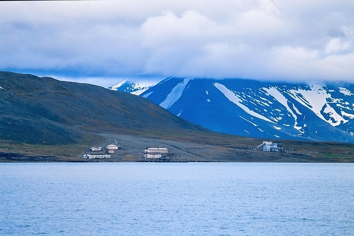 View at an old mining village on Svalbard coast with high mountains, Svalbard, by Lars Johansson