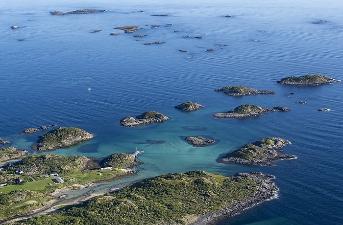 Coast and rocky islands in the blue sea, sea with archipelago islands, Ulvågsundet, Vesterålen, Norway, Europe, by Mara Brandl