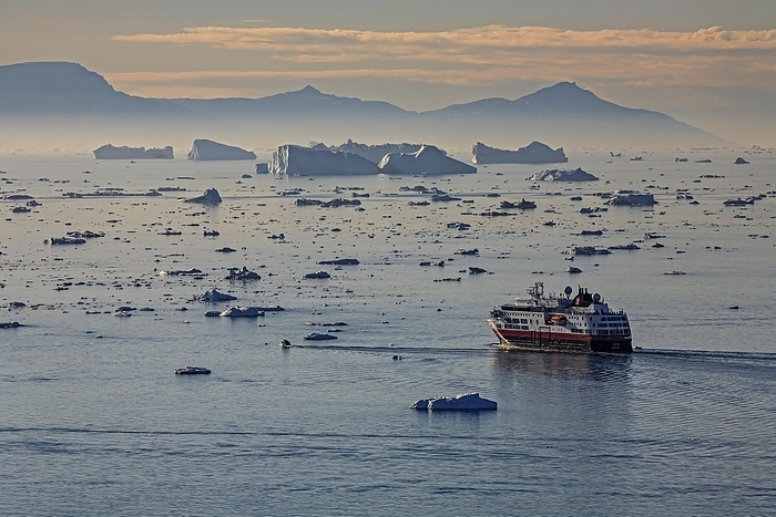Hurtigruten ship in front of icebergs, reflection, midnight sun, summer, Ilulissat Icefjord, Disko Bay, Greenland, North America, by Martina Melzer