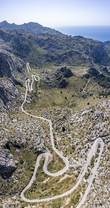 Aerial view, mountain pass with switchbacks to Sa Colobra, Serra de Tramuntana, Majorca, Balearic Islands, Spain, Europe, by Moritz Wolf