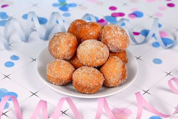 German traditional 'Berliner Pfannkuchen', a donut without hole filled with jam traditional served during carnival, by Firn