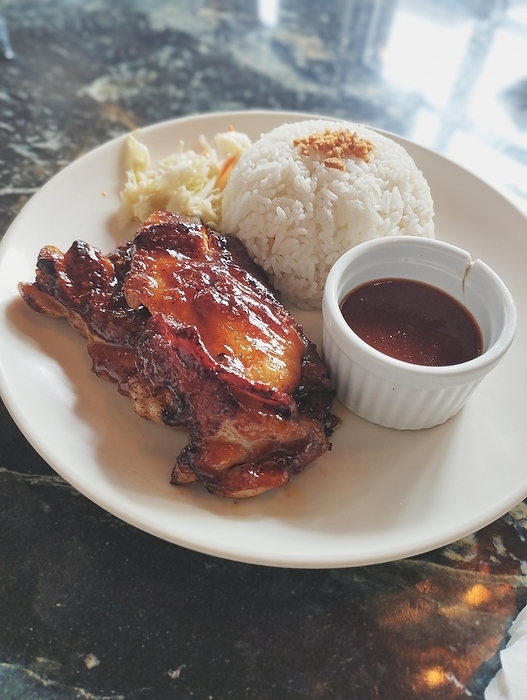 Chicken inasal with rice and atchara or papaya salad served with barbecue sauce, authentic Filipino food from the Philippines. Dipolog, Philippin, by MartinxMarie
