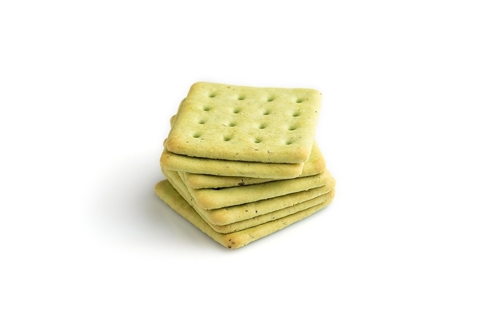Green cracker pile isolated on white background. side view, close up, by ULADZIMIR ZGURSKI