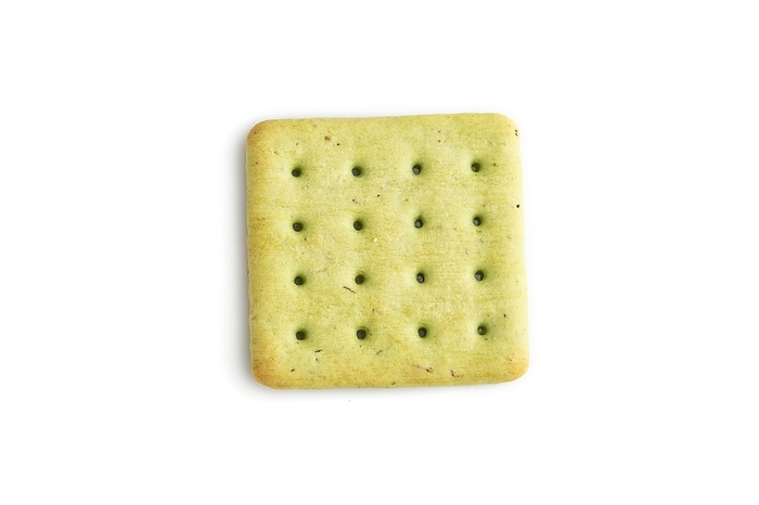 Green cracker pile isolated on white background. top view, flat lay, close up, by ULADZIMIR ZGURSKI