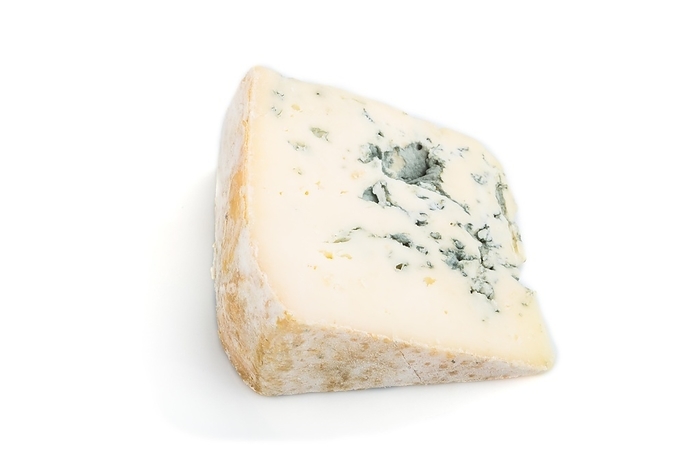 Piece of blue cheese isolated on white background. Side view, close up, by ULADZIMIR ZGURSKI