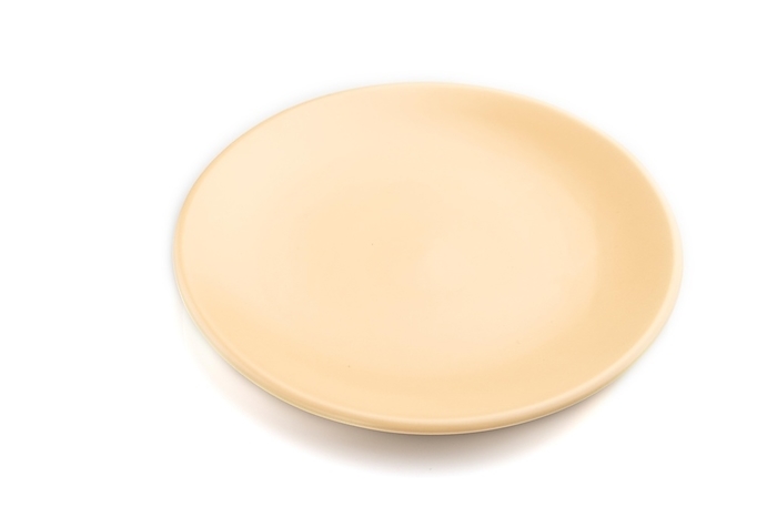 Empty beige ceramic plate isolated on white background. Side view, close up, by ULADZIMIR ZGURSKI
