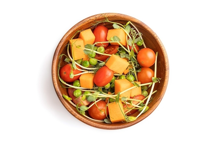Vegetarian vegetable salad of tomatoes, pumpkin, microgreen pea sprouts isolated on white background. Top view, flat lay, close up, by ULADZIMIR ZGURSKI