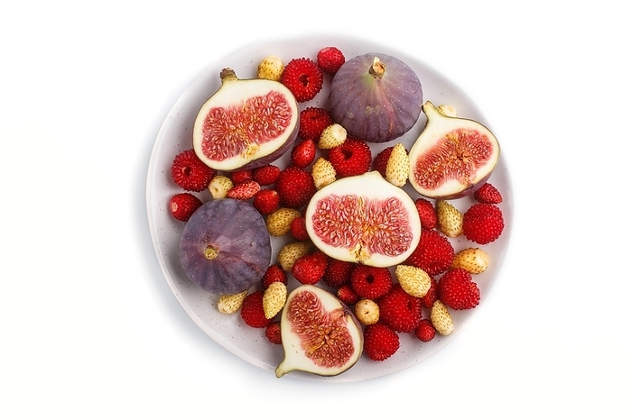 Fresh figs, strawberries and raspberries on white ceramic plate isolated on white background. top view, flat lay, close up, by ULADZIMIR ZGURSKI