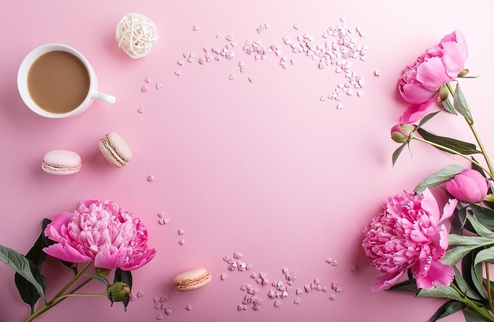 Pink peony flowers and a cup of coffee on a pink pastel background. Morninig, spring, fashion composition. Flat lay, top view, copy space, by ULADZIMIR ZGURSKI