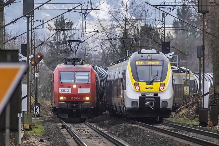 Germany Railway line near Stuttgart with regional train from bwegt, SWEG. RBH Logistics goods train, class BR145 locomotive, Stuttgart, Baden W rttemberg, Germany, Europe, by Arnulf Hettrich