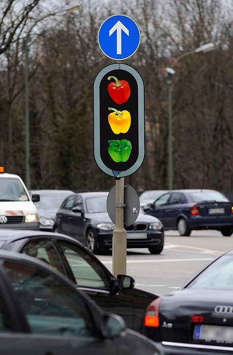 Traffic light with three bell pepper, paprika in red, yellow and green, remind to eat vitamines in winter, by Dirk v. Mallinckrodt